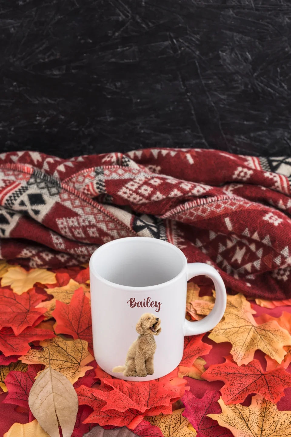 empty-mug-leaves-near-blanket